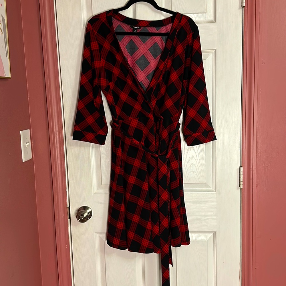 Brand new, black, and red plaid dress. From torrid. Size 1.